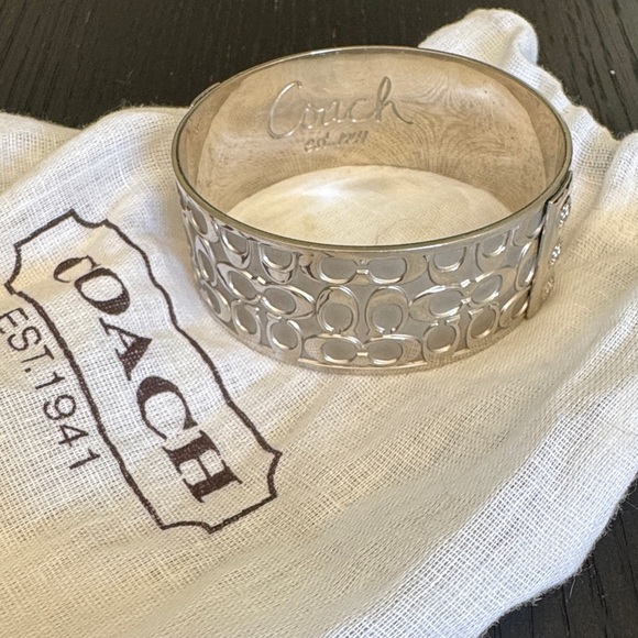Coach Signatures Logo Silver Bangle Bracelet. Dustbag. 1” wide. 2.5” diameter - Picture 2 of 4